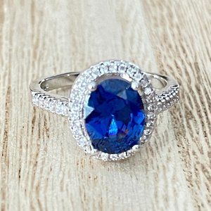 Oval Simulated Sapphire Halo Ring - 925 Sterling Silver